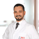 Doç. Dr. Emre Tokuç