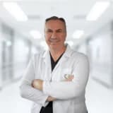 Dr. Murat Metek
