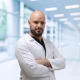 Uzm. Dr. Kenan Moral Profil Fotoğrafı