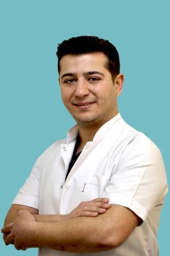 Dt. Nüzhet Enes Arıyürek