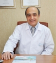 Dr. Dt. Kenan Şahin Diş Hekimi