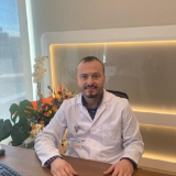 Doç. Dr. Asim Enhoş