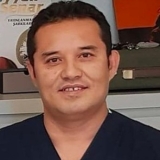 Dr. Nejat Can