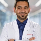 Op. Dr. Muaz Zuhur