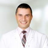 Op. Dr. Akgün Sayar